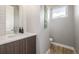 Sleek powder room with stylish vanity, modern fixtures, and a neutral color scheme at 3142 W 20Th Ave, Denver, CO 80211