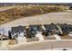 A new community featuring modern homes with spacious driveways and beautiful landscaping at 3378 Backdrop Ct, Castle Rock, CO 80108