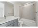This bathroom features modern fixtures, a shower over tub and light gray walls at 3378 Backdrop Ct, Castle Rock, CO 80108