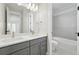 A stunning bathroom featuring double sinks and a shower-over-tub combination at 3378 Backdrop Ct, Castle Rock, CO 80108