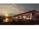 Exterior view of the clubhouse during sunset with nearby parking and landscaping at 3378 Backdrop Ct, Castle Rock, CO 80108