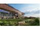 Exterior of the community fitness center that features large picture windows allowing for an abundance of natural light at 3378 Backdrop Ct, Castle Rock, CO 80108