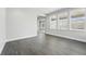 Bright living space with large windows and sliding glass doors, offering views and easy access to the outdoors at 3378 Backdrop Ct, Castle Rock, CO 80108