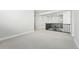 Spacious loft area with plush carpeting and an overlooking staircase at 3378 Backdrop Ct, Castle Rock, CO 80108