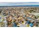 Wide aerial shot showing a residential area with neatly arranged houses and roads at 6306 Xavier St, Arvada, CO 80003