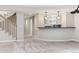 Finished basement offers a wet bar, open space, and potential for entertainment at 115 S Glencoe, Denver, CO 80246