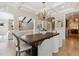 Dining area with hardwood floors and archway to living room at 115 S Glencoe, Denver, CO 80246