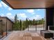 Relaxing balcony with outdoor seating and panoramic views of the surrounding landscape at 436 N Fuller Placer Rd, Breckenridge, CO 80424