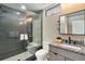 Sleek bathroom with glass enclosed shower, modern vanity, and ample natural light at 436 N Fuller Placer Rd, Breckenridge, CO 80424