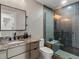 Modern bathroom with a glass-enclosed shower, granite countertops, and sleek fixtures at 436 N Fuller Placer Rd, Breckenridge, CO 80424