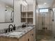 Bathroom showcasing double sinks, granite countertops, and a stylish glass-enclosed shower at 436 N Fuller Placer Rd, Breckenridge, CO 80424