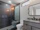 Contemporary bathroom with a sleek vanity, modern fixtures, and a glass-enclosed shower at 436 N Fuller Placer Rd, Breckenridge, CO 80424