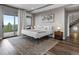 Bedroom with a walk-out balcony offering scenic views at 436 N Fuller Placer Rd, Breckenridge, CO 80424