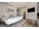Serene bedroom with a king bed, fireplace, and ensuite bathroom with a glimpse of the vanity at 436 N Fuller Placer Rd, Breckenridge, CO 80424