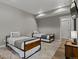 Guest bedroom with two twin beds, neutral decor, and ample space at 436 N Fuller Placer Rd, Breckenridge, CO 80424
