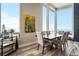 Dining room with large windows offering an amazing view and hardwood floors at 436 N Fuller Placer Rd, Breckenridge, CO 80424