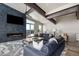 Spacious living room with fireplace, large windows and comfortable seating at 436 N Fuller Placer Rd, Breckenridge, CO 80424
