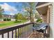 Relaxing view from balcony overlooking manicured green space and mature trees at 1370 S Idalia St # A, Aurora, CO 80017