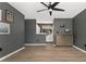 Bedroom with hardwood floors that leads to the primary bathroom and walk-in closet at 1370 S Idalia St # A, Aurora, CO 80017