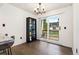 Bright dining area with backyard views and hardwood floors, perfect for entertaining at 1370 S Idalia St # A, Aurora, CO 80017