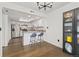 Modern kitchen with stainless steel appliances, a breakfast bar, and contemporary finishes at 1370 S Idalia St # A, Aurora, CO 80017