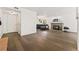 Spacious living room featuring hardwood flooring, a cozy fireplace, and ample natural light at 1370 S Idalia St # A, Aurora, CO 80017