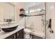 Modern bathroom featuring a glass-enclosed shower, vessel sink, and stylish fixtures, creating a spa-like experience at 989 Graland Pl, Highlands Ranch, CO 80126