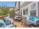 This outdoor deck is perfect for entertaining with comfortable lounge seating and a dining area for alfresco meals at 989 Graland Pl, Highlands Ranch, CO 80126