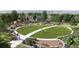 Large community park featuring open green spaces, play areas, and walking paths for residents to enjoy at 16488 W 92Nd Pl, Arvada, CO 80007