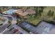 Community amenities featuring a swimming pool, clubhouse, and courts for various recreational activities at 16488 W 92Nd Pl, Arvada, CO 80007