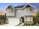 Charming two-story home featuring a light gray exterior, a two-car garage, and stylish architectural details at 16488 W 92Nd Pl, Arvada, CO 80007