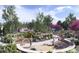 Community playground with modern equipment, a sand pit, and ample space for children to play safely at 16488 W 92Nd Pl, Arvada, CO 80007