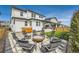 Backyard with a fire pit and seating area, perfect for outdoor entertaining at 2840 E 102Nd Pl, Thornton, CO 80229