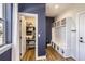 Mudroom featuring storage cubbies, a bench, and a pantry with shelving at 2840 E 102Nd Pl, Thornton, CO 80229
