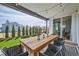 Charming covered patio with outdoor seating and string lights for entertaining at 2840 E 102Nd Pl, Thornton, CO 80229