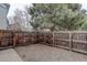 Wood privacy fence surrounds this townhome's backyard area with easy access at 4504 S Cimmarron Cir # D, Aurora, CO 80015