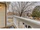 White balcony with community views in this townhome provides outdoor living space at 4504 S Cimmarron Cir # D, Aurora, CO 80015