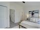 Bright bedroom with walk-in closet, ensuite bathroom, and comfortable decor and carpeted floors at 4504 S Cimmarron Cir # D, Aurora, CO 80015