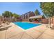 Inviting community pool with lounge chairs and shaded seating, perfect for relaxation at 303 W Lehow Ave # 22, Englewood, CO 80110