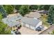 An aerial view showcasing a property with a spacious driveway and multiple-car garage at 1217 Lincoln St, Longmont, CO 80501