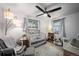 Bedroom with a ceiling fan, area rug, and neutral paint at 1217 Lincoln St, Longmont, CO 80501