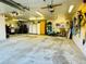 Spacious garage featuring ample storage cabinets, skylights, and room for multiple vehicles or a workshop at 1217 Lincoln St, Longmont, CO 80501