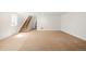 Finished basement offers a large open space and a staircase to the main level at 3402 N Clayton St, Denver, CO 80205