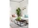 Bright and airy living room featuring modern decor and a seamless transition to the outdoor space at 3402 N Clayton St, Denver, CO 80205