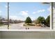 A view from above, showcasing the peaceful neighborhood street and nearby park at 3402 N Clayton St, Denver, CO 80205