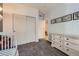 Well-organized bedroom featuring closet storage, dresser, and a playful design that sparks creativity and imagination at 12 Apache Plume St, Brighton, CO 80601