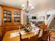 Dining room flows into the living room with fireplace, creating an inviting space at 5006 S Nelson St # B, Littleton, CO 80127