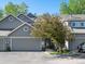 Charming two-story home with a well-manicured front yard, complemented by a cozy two-car garage at 5006 S Nelson St # B, Littleton, CO 80127