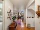 Bright entryway featuring hardwood floors, decorative accents, and seamless flow into living spaces at 5006 S Nelson St # B, Littleton, CO 80127