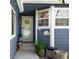 Inviting front entrance with charming details, including a decorative wreath and welcoming decor at 5006 S Nelson St # B, Littleton, CO 80127